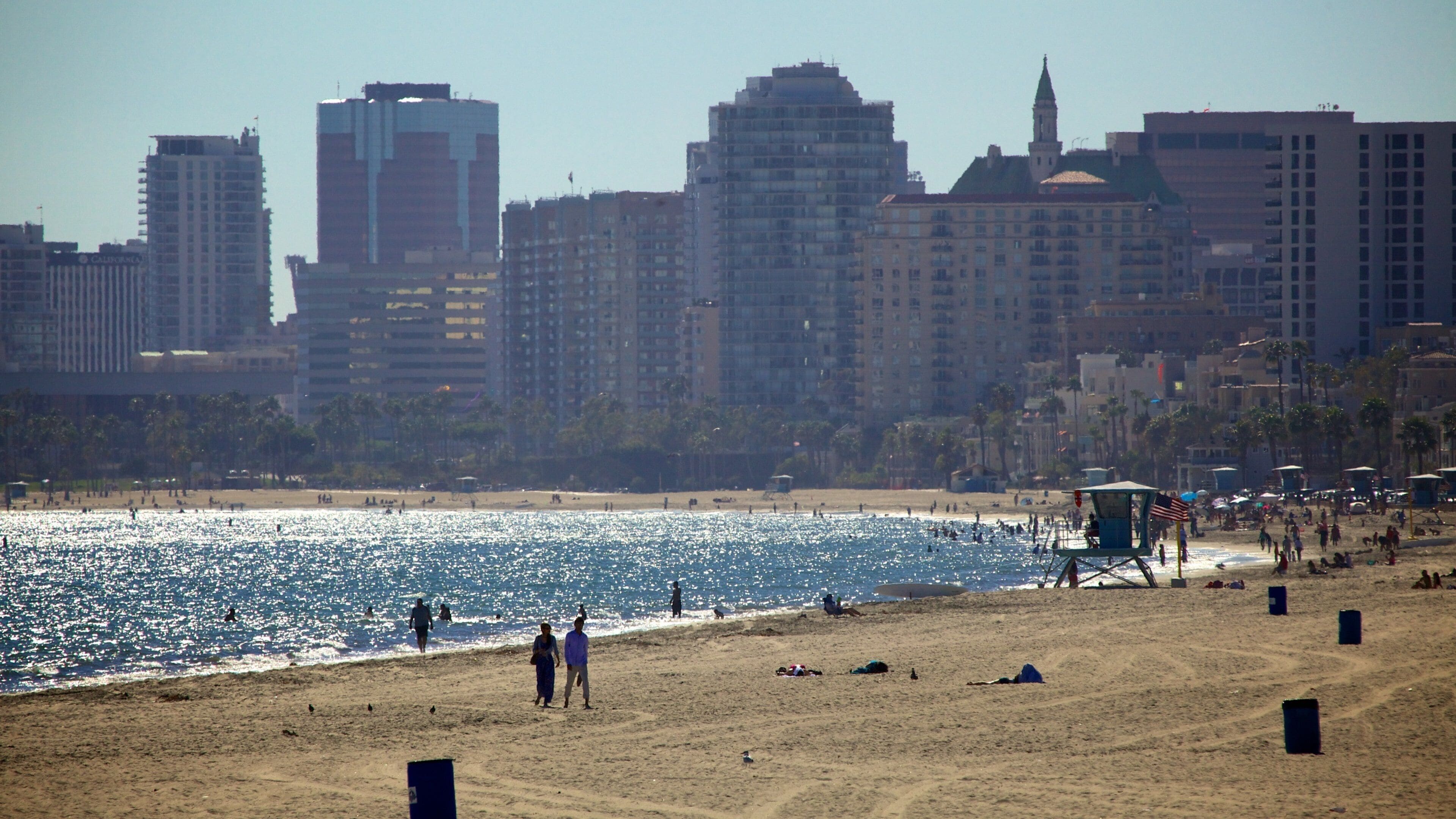 Long Beach featuring a sandy beach, a bay or harbor and a city