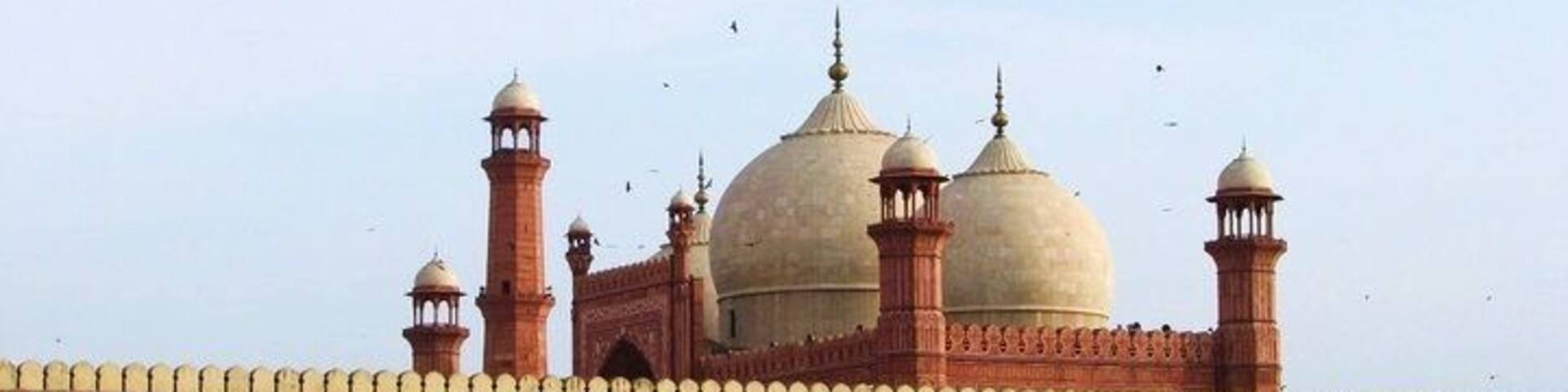 Emperor's Mosque: One of the most beautiful mosques I have ever been to. It was constructed by Emperor Aurangzeb (the son of Shah Jahan) in the 17th century and was at that time the largest mosque in the world, a record it kept for centuries.
Aurangzeb was the most powerful king of his time. Every third human on earth was a subject of his and his empire had 24% of the world's GDP. The mosque has Persian, Arabic and Indic architecture. His father's Taj Mahal could easily fit inside her large courtyard.
It was heavily damaged during the Sikh occupation of Lahore and prayers were banned. Extensive repairs had to be carried out after their fall from power. One of the highlights of my trip to Lahore.