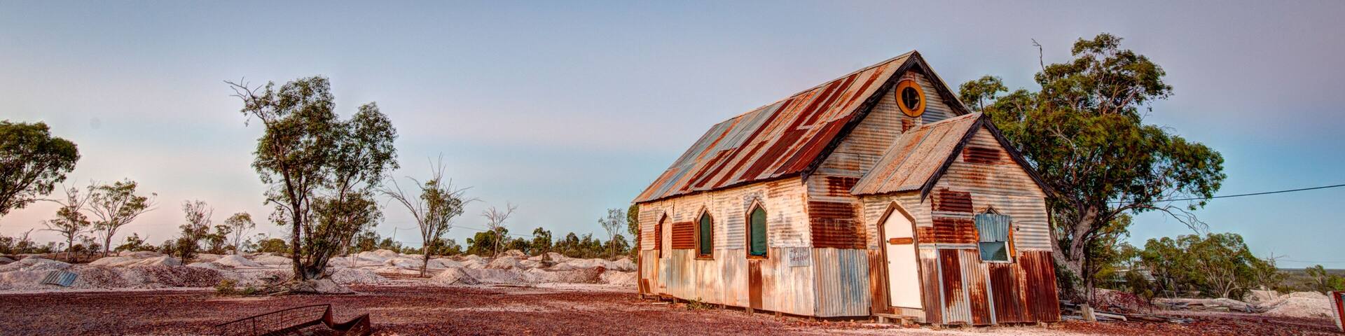 Panorama of the Rusty old church at Lightning Ridge Australia