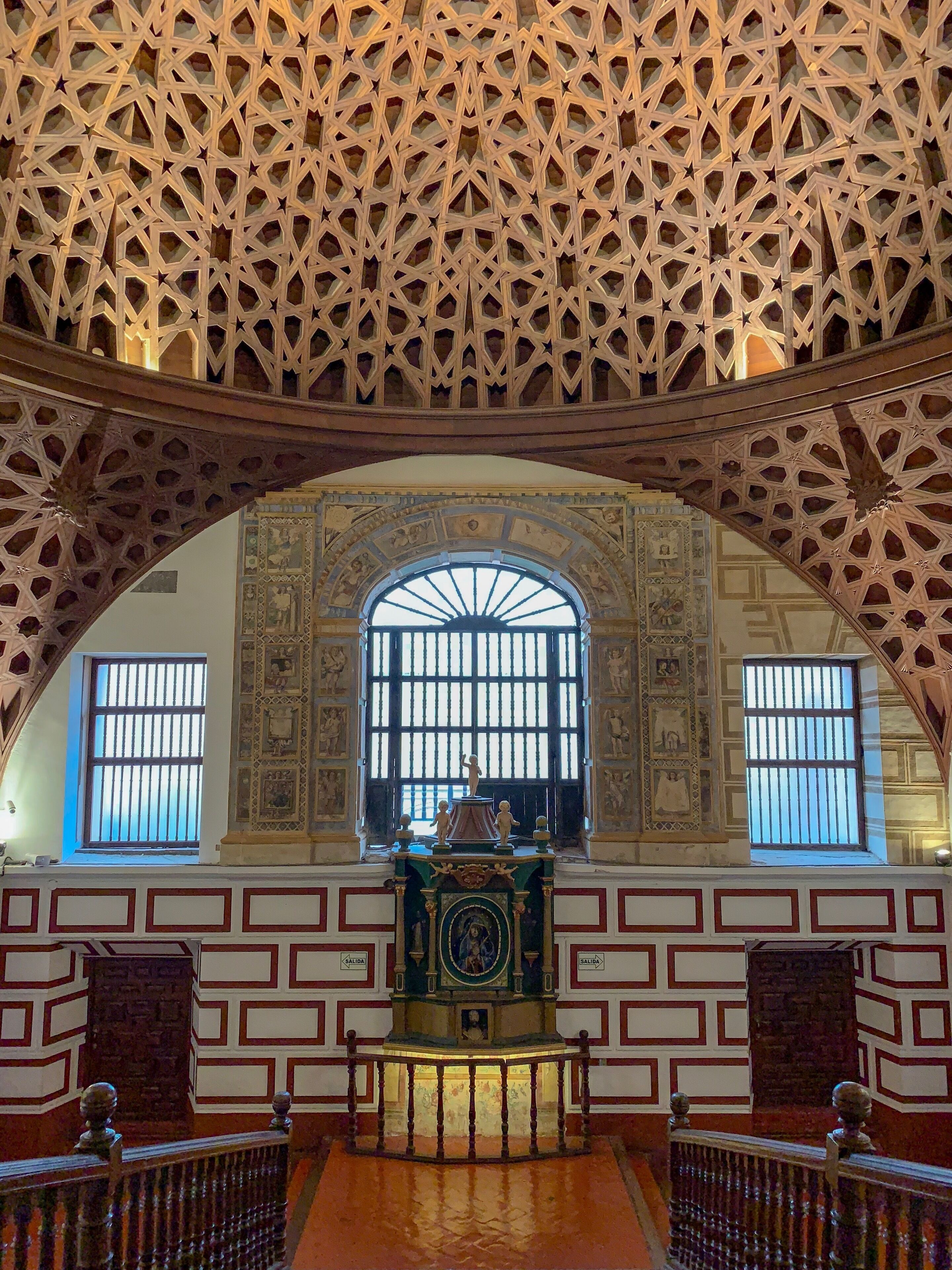 This is a beautiful stairwell at the Saint Francis Monastery with an intricate wood ceiling. There are no nails or glue in the intricate ceiling. #lifeatexpedia 