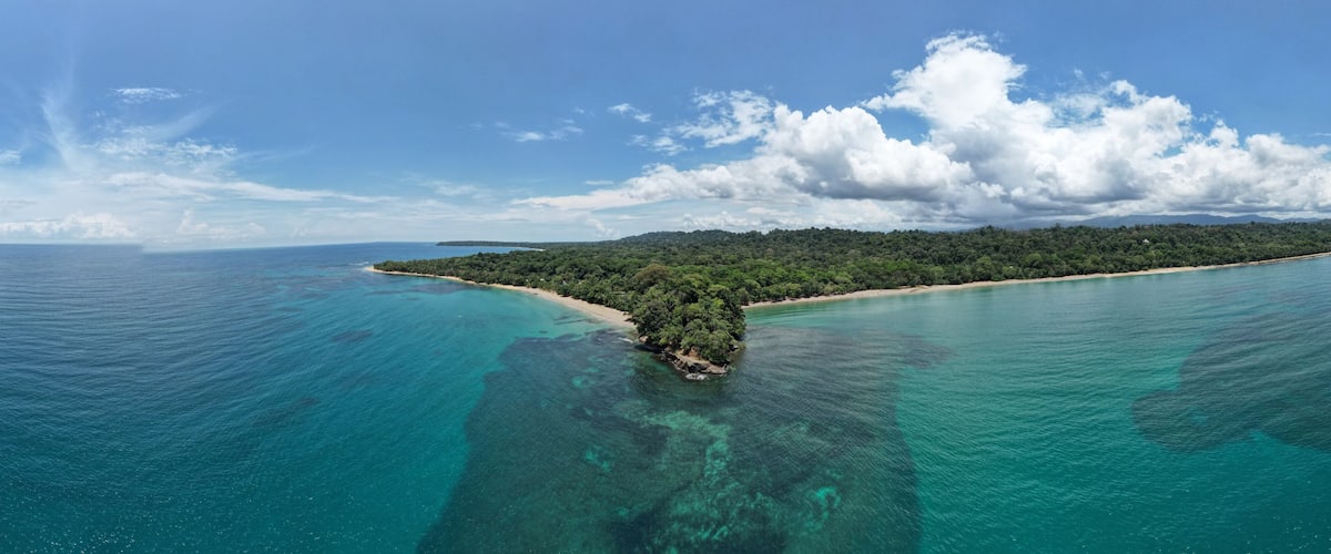 Lush tropical Caribbean Coast of Limon in Costa Rica -aerial views of Cocles, Punta Uva, Playa Chiquita and Puerto Viejo