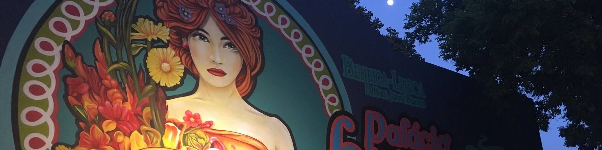 A mural of a woman holding flowers with the text "Palacio Baldorioty de Carvalho" and the year "1840".