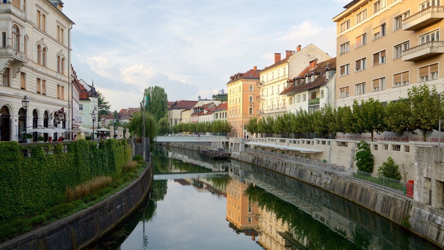 Ljubljana featuring a river or creek, a city and heritage architecture