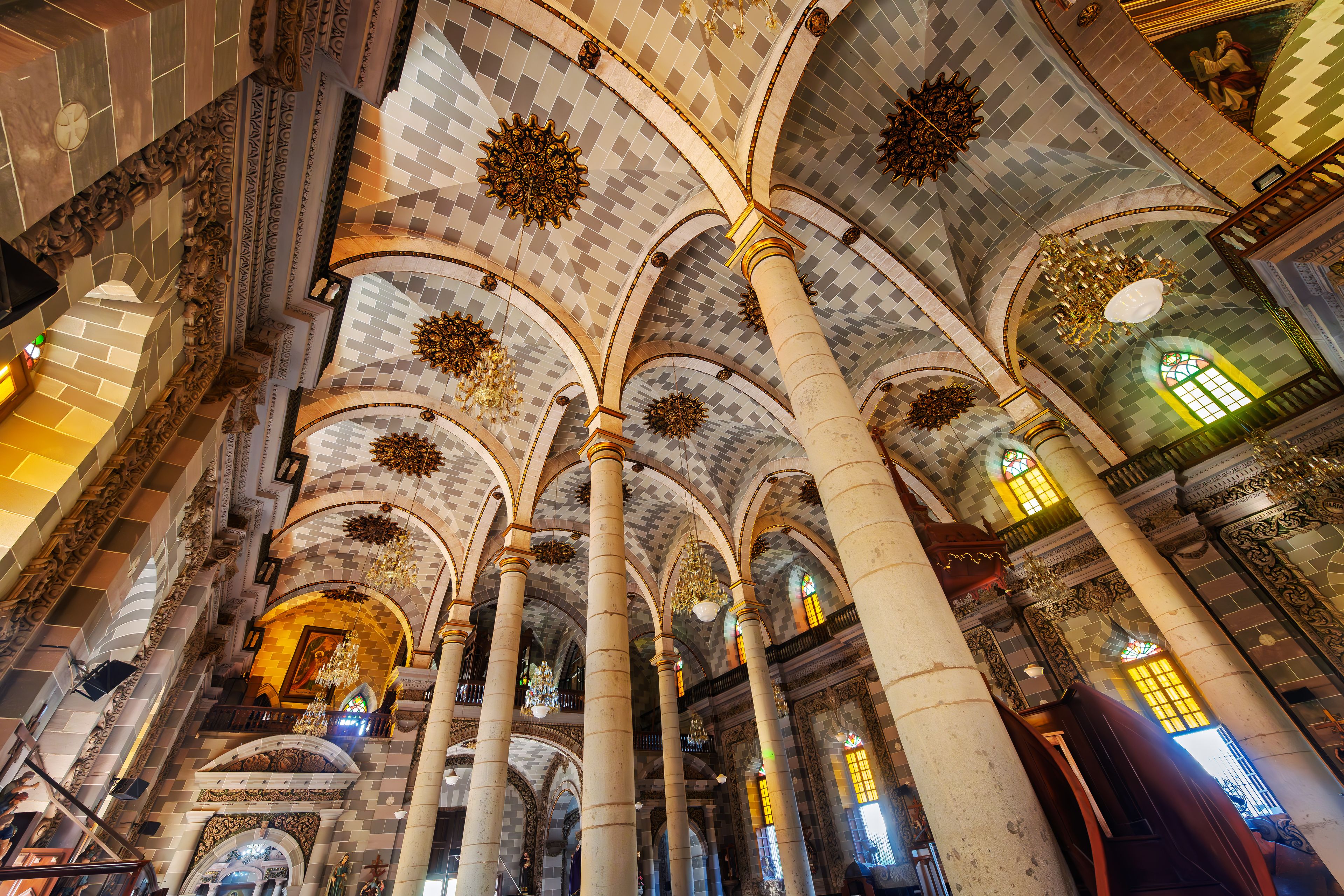 The ornate vaulted interior of the 19th century Cathedral Basilica of the Immaculate Conception in Mazatlán, Mexico. 
