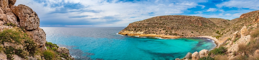 Panoramic view of wild beach in Lampedusa, Sicily (Cala Pulcino)