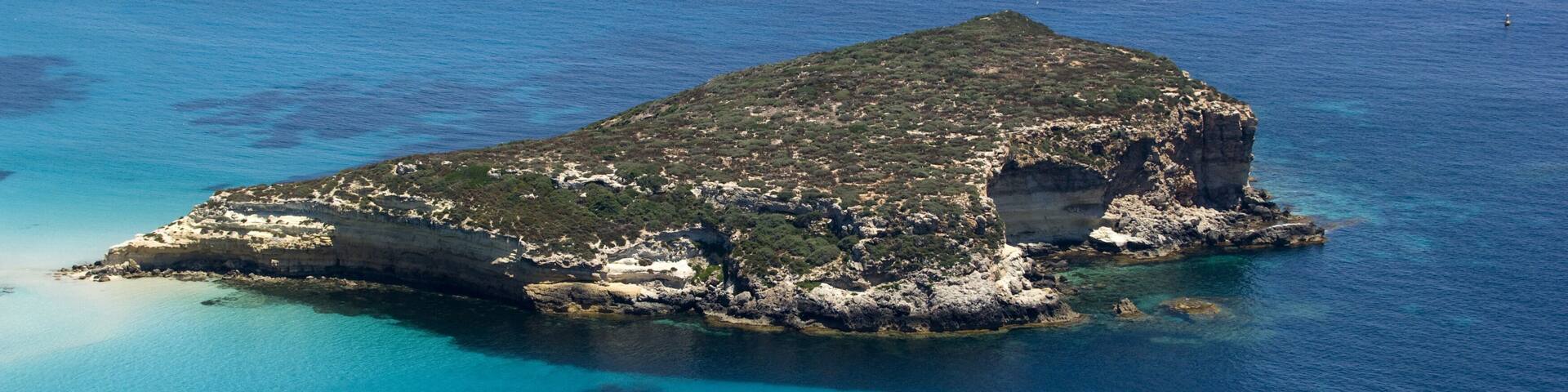 lampedusa island, landscape with island of Rabbit and beach, sicily, italy