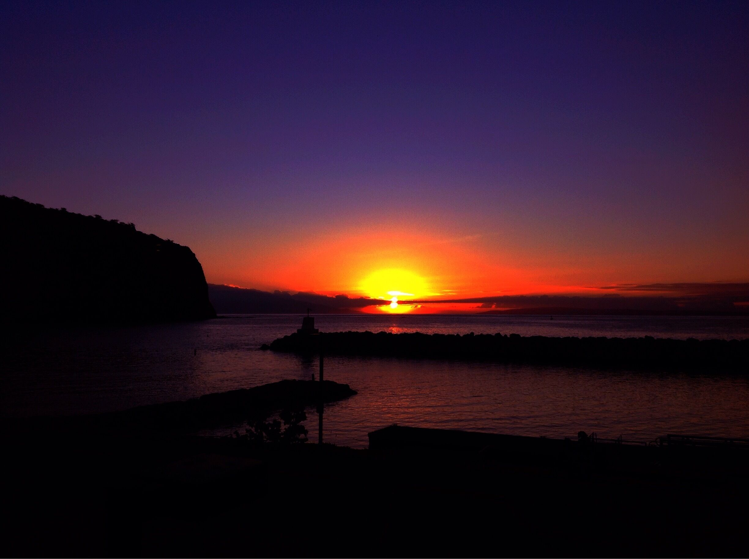 Heading out when it's dark has some great benefits, like this breathtaking sunrise over Manele Bay Small Boat Harbor!