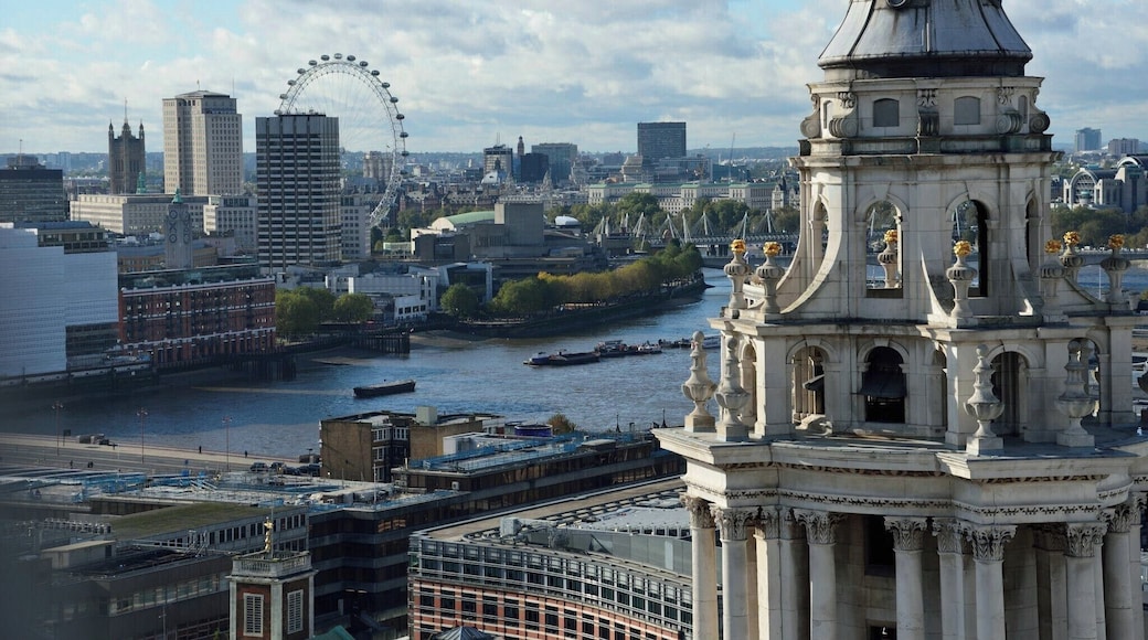 To get this amazing view of London, climb to the Stone Gallery of the St Paul's Cathedral:
The Stone Gallery is the first of two galleries above the Whispering Gallery that encircle the outside of the dome. The Stone Gallery stands at 173 ft (53.4 metres) from ground-level and can be reached by 378 steps.