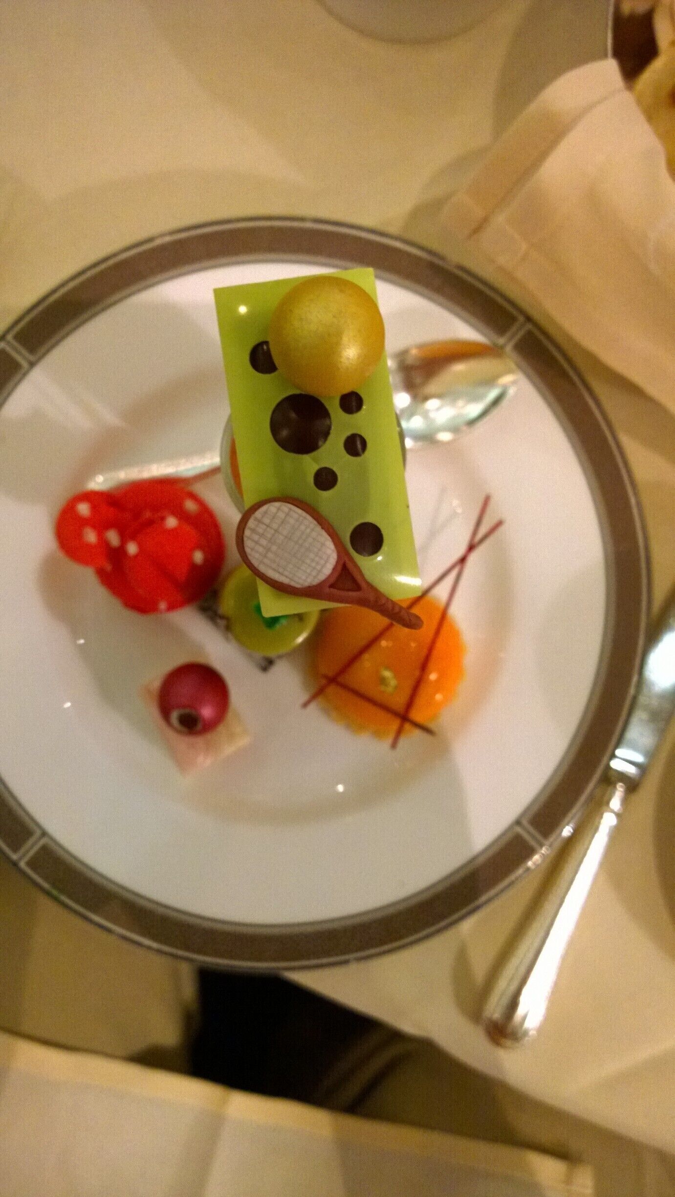 Afternoon Tea sweets. This was during Wimbledon, hence a tennis-themed cake. #lifeatexpedia