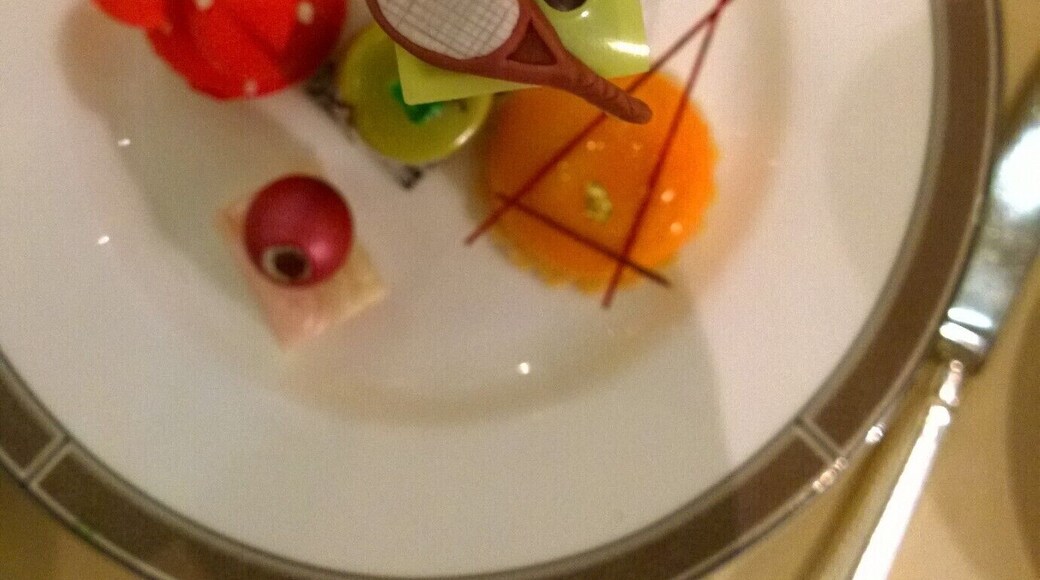 Afternoon Tea sweets. This was during Wimbledon, hence a tennis-themed cake. #lifeatexpedia