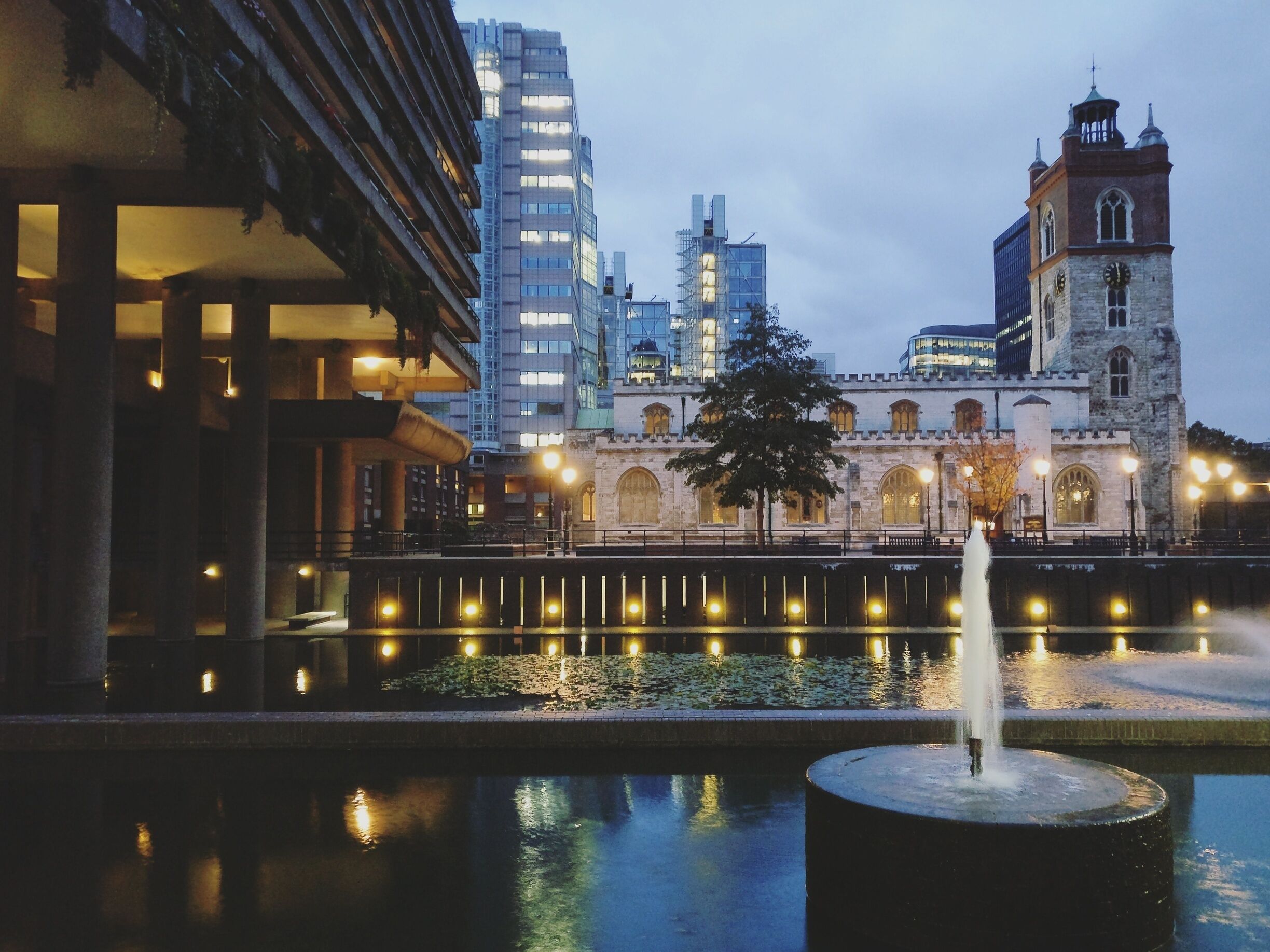 Barbicania. 
The barbican centre is a place to get lost and wander about. Concrete walls, brutalist architecture, contemporary art and a sense of tranquility make up this "urban utopia". 
#Merch #Barbican #art #London