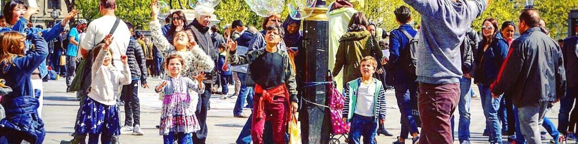 ...Bubbles for travel to Asia. A young traveller bringing smiles to the kids' faces with Bubbles. All tips he's making goes toward getting him to Asia. Just one of the stories on the streets of London.