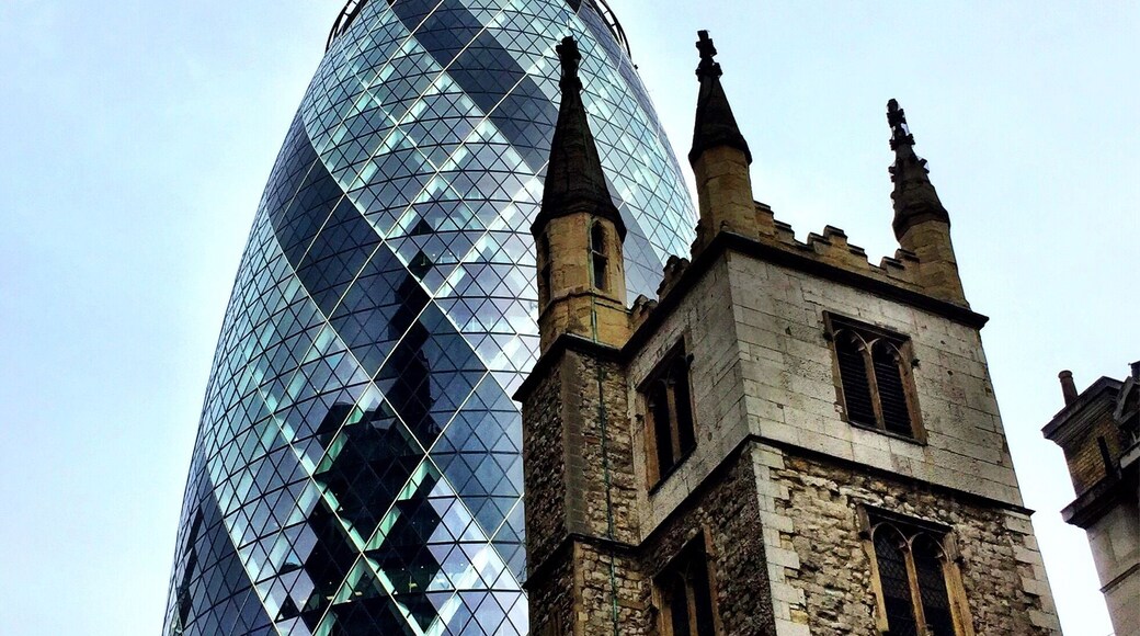 30 St Mary Axe, popularly known as "The Gherkin", with the church of St Andrew Undershaft in the foreground - two of the faces of London (a walk down Leadenhall Street really brings this home, with churches and the famous Leadenhall Market squeezed between modern structures). Taken March 2017.
