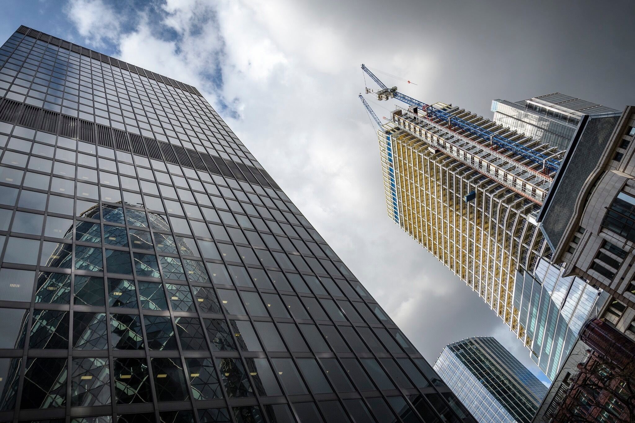 Gerkin Reflection.

Whilst having a wander around the Gerkin and the immediate area looking for angles and light. I turned my back on the Gerkin and found this reflection which gave we some interesting angles and perspective with the wide angle lens.