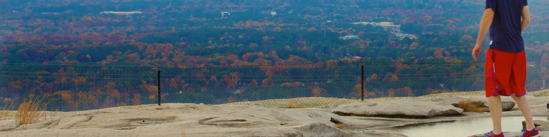 Georgia which includes skyline and views as well as an individual male