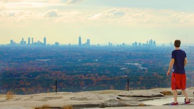 Georgia which includes skyline and views as well as an individual male