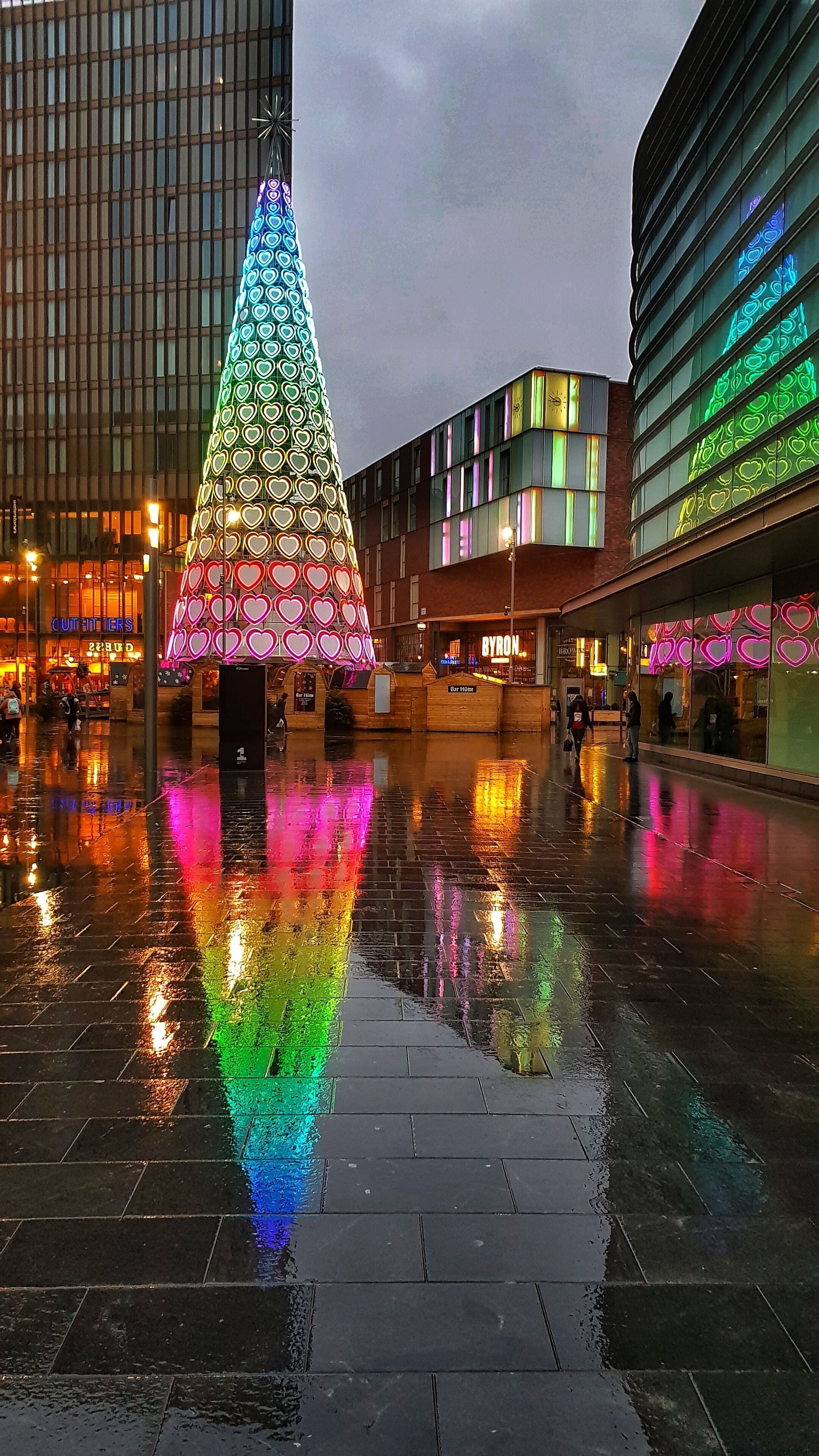 Christmas reflections on a wet Sunday morning. 
Taken at Liverpool One on a Samsung S8.