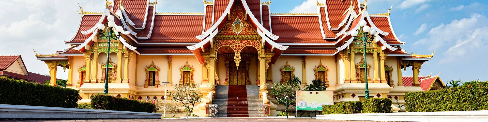 Stunning view of the beautiful Wat That Luang Neua with gold-colored decorations. The Wat That Luang Neua is located in the centre of the city of Vientiane, Laos. , Shutterstock ID 1334550050, Purch