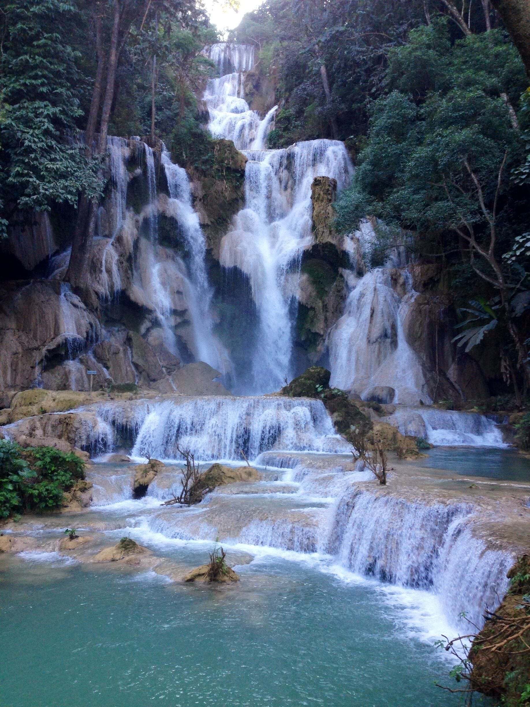 The incredibly photogenic Kuangi Si waterfalls just outside Luang Prabang. Even though it is most crowded during the middle of the day, it is nice to swim in the chilly lower pools during the heat of the day.