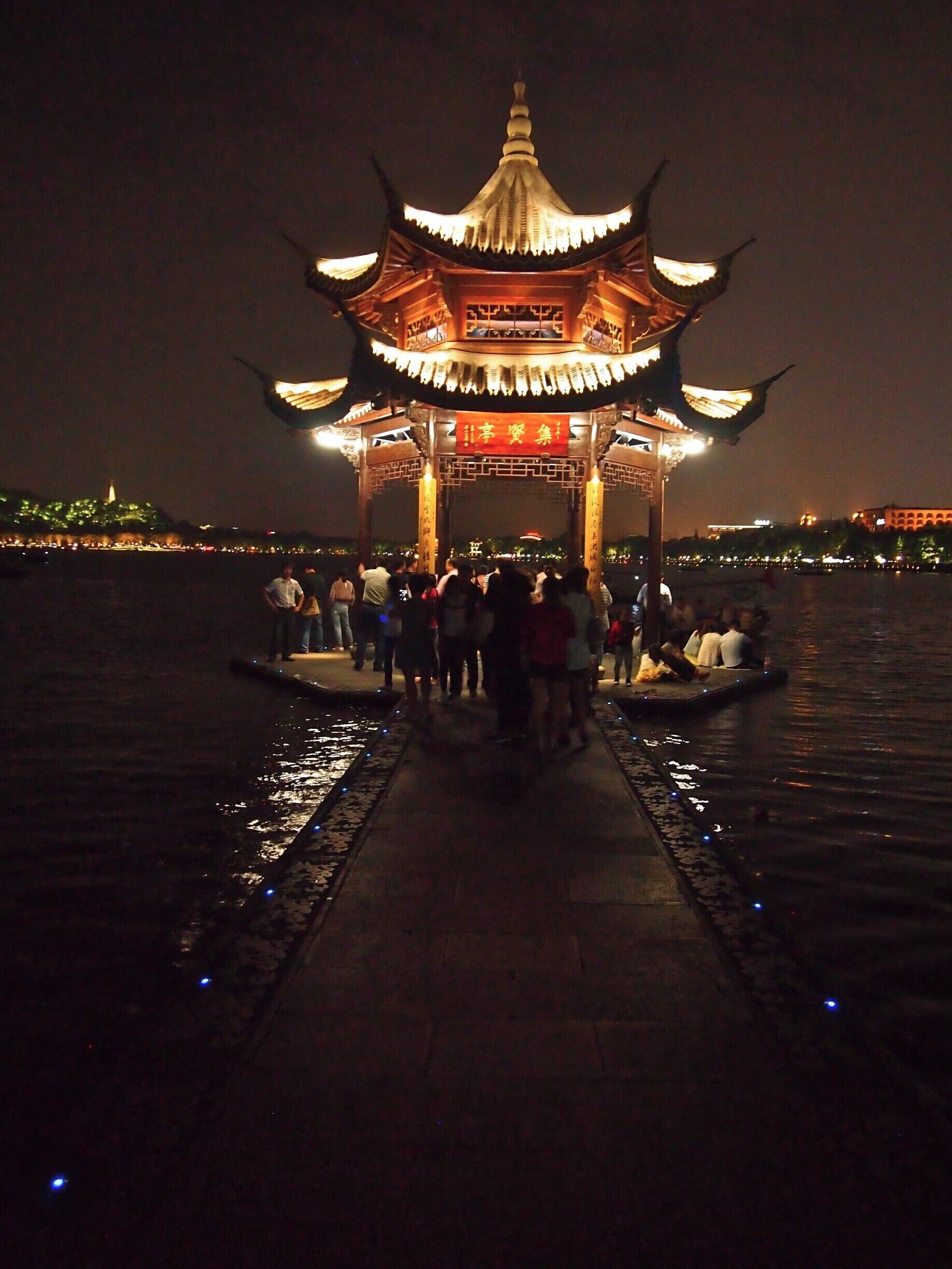 Strolling around the West Lake at night. Hangzhou's West Lake is considered one of the most romantic places in the whole of China!