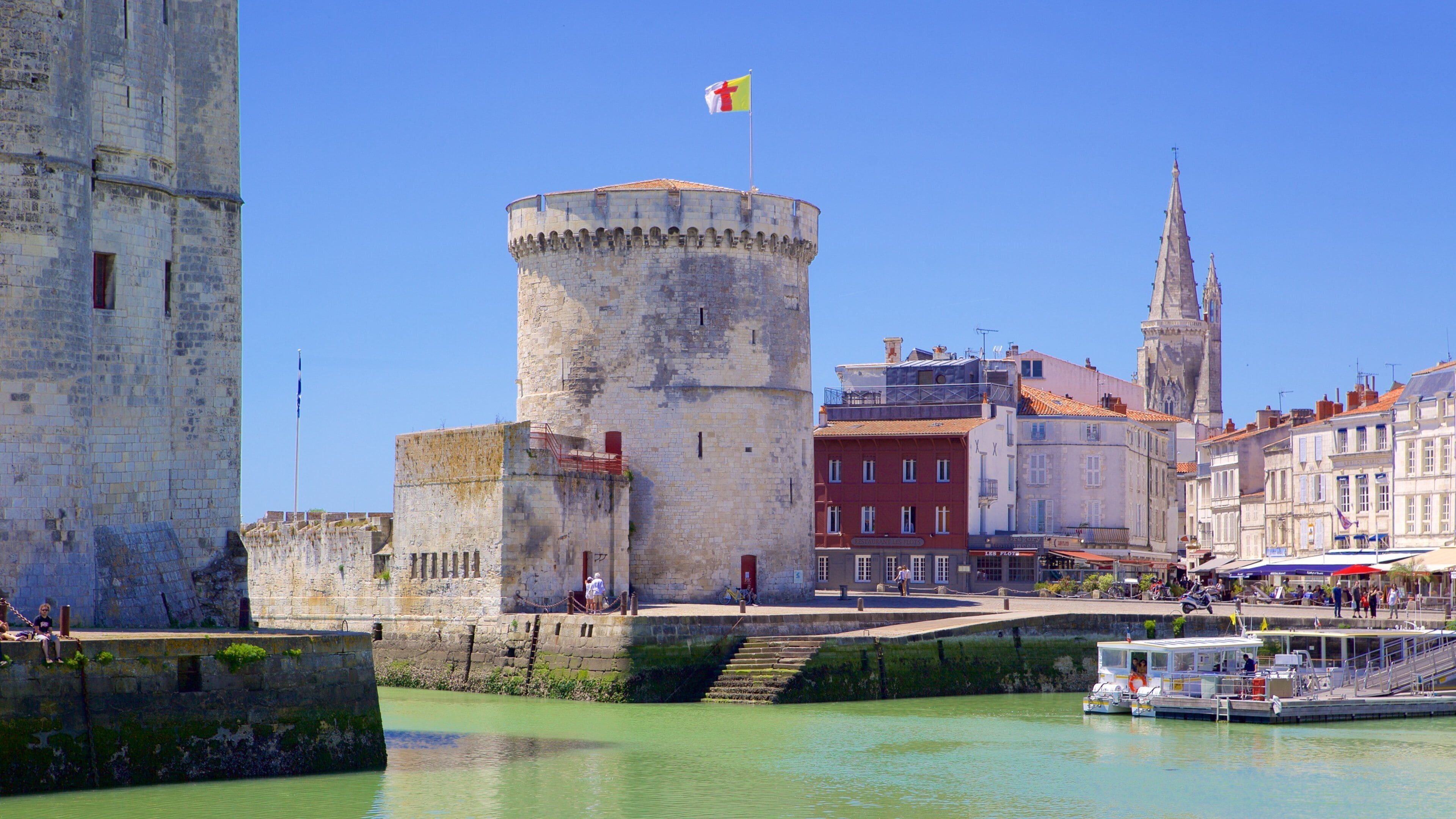 La Rochelle which includes a coastal town and heritage elements