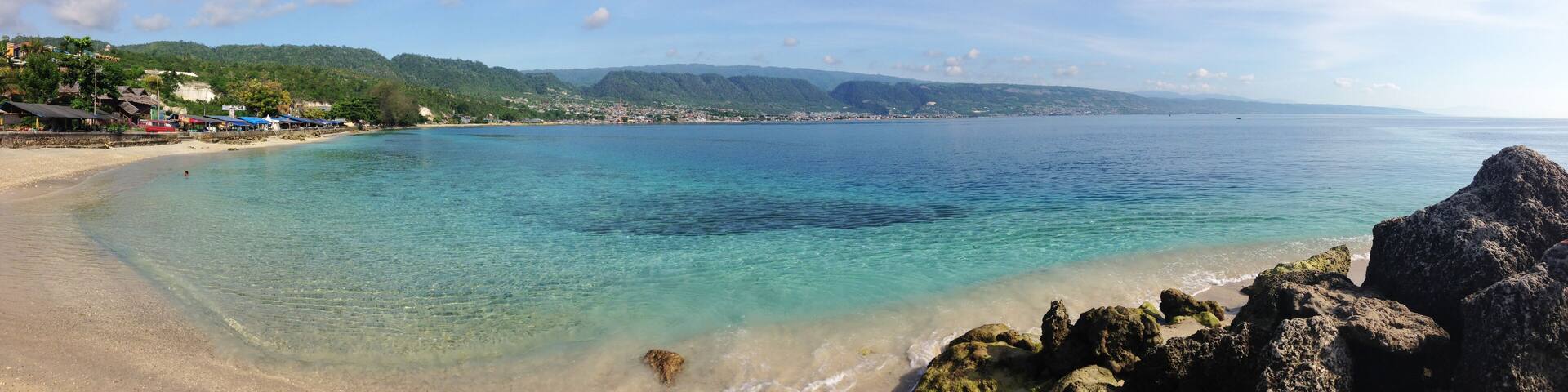 view of the sea and mountains. Beautiful view at Kilo Lima Beach Luwuk Central Sulawesi Indonesia