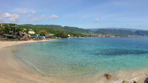 view of the sea and mountains. Beautiful view at Kilo Lima Beach Luwuk Central Sulawesi Indonesia