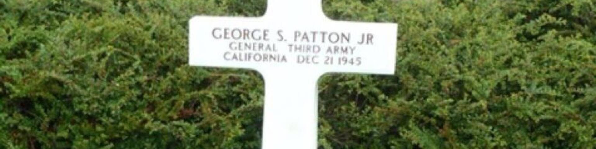 Gen George Patton is buried with his troops at US WWII Cemetery in Hamm, Luxembourg. Over 5,000 Americans are buried here, many from Battle of Bulge. Abmc.gov great website re US war cemeteries.