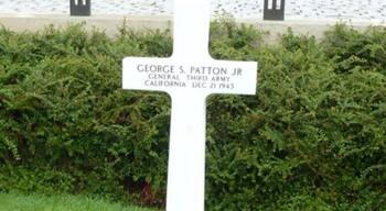 Gen George Patton is buried with his troops at US WWII Cemetery in Hamm, Luxembourg. Over 5,000 Americans are buried here, many from Battle of Bulge. Abmc.gov great website re US war cemeteries.