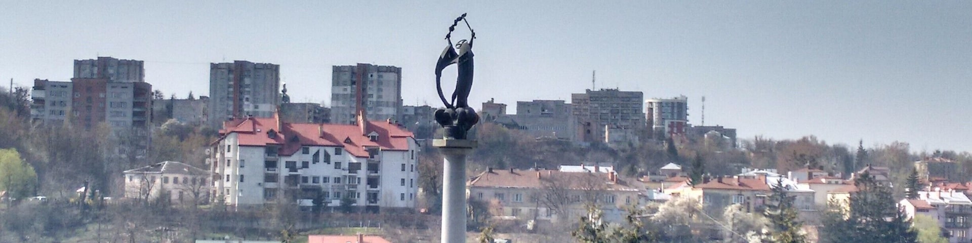An Angel rises over Lychakiv Cemetery and the ancient town of Lviv in the West of Ukraine.