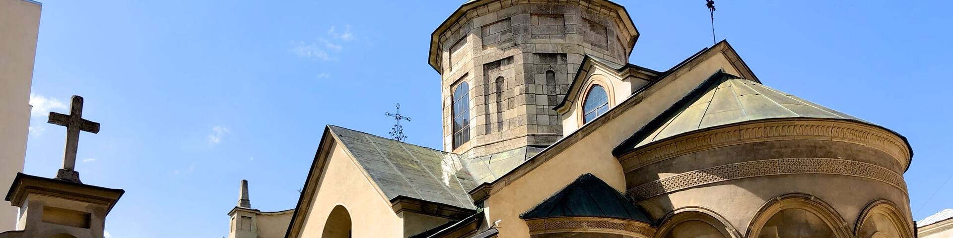 One church you should not miss is the elegant 1363 Armenian Cathedral with its ancient-feeling interior. The placid cathedral courtyard is a maze of arched passageways and squat buildings festooned with intricate Caucasian detail. Stepping into the courtyard feels like entering another era – gravestones bearing inscriptions in the 54 letters of the Armenian alphabet pave the floor.
Located in the city's Old Town, north of the market square. Until 1945 it was the cathedral of the Armenian Catholic Archdiocese of Lviv, since 2000 it serves as a cathedral of the Eparchy of Ukraine of the Armenian Apostolic Church