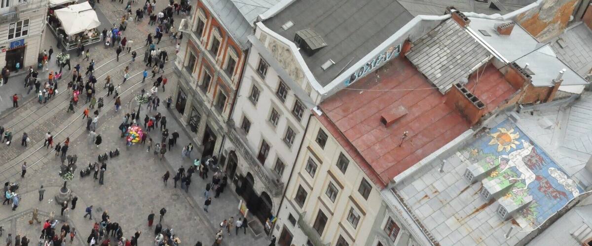 Lovely view of old Lviv from the top of the tower in the center of Ploscha Rynok. That's the Latin Cathedral, one of the oldest still-active churches in the city. To climb the tower, go up the first four flights of stairs to the ticket desk. The way is clearly marked with signs in multiple languages, including English. At the desk, pay 10 hrivna and then keep climbing up, up, and up until you reach the open deck at the top of the tower. Then enjoy the view!