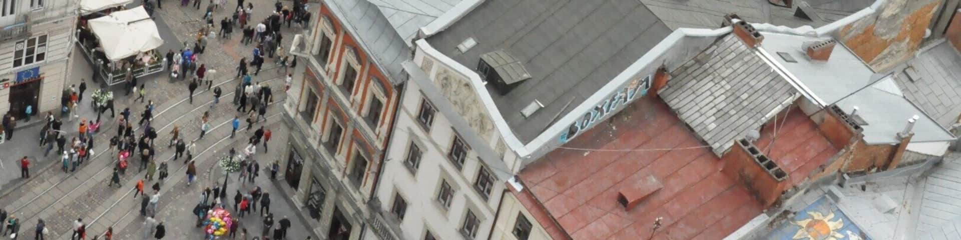 Lovely view of old Lviv from the top of the tower in the center of Ploscha Rynok. That's the Latin Cathedral, one of the oldest still-active churches in the city. To climb the tower, go up the first four flights of stairs to the ticket desk. The way is clearly marked with signs in multiple languages, including English. At the desk, pay 10 hrivna and then keep climbing up, up, and up until you reach the open deck at the top of the tower. Then enjoy the view!