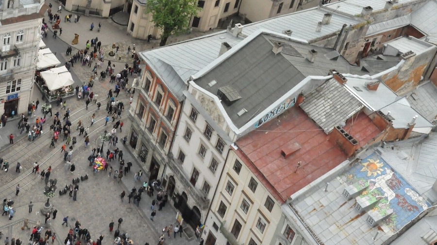 Lovely view of old Lviv from the top of the tower in the center of Ploscha Rynok. That's the Latin Cathedral, one of the oldest still-active churches in the city. To climb the tower, go up the first four flights of stairs to the ticket desk. The way is clearly marked with signs in multiple languages, including English. At the desk, pay 10 hrivna and then keep climbing up, up, and up until you reach the open deck at the top of the tower. Then enjoy the view!