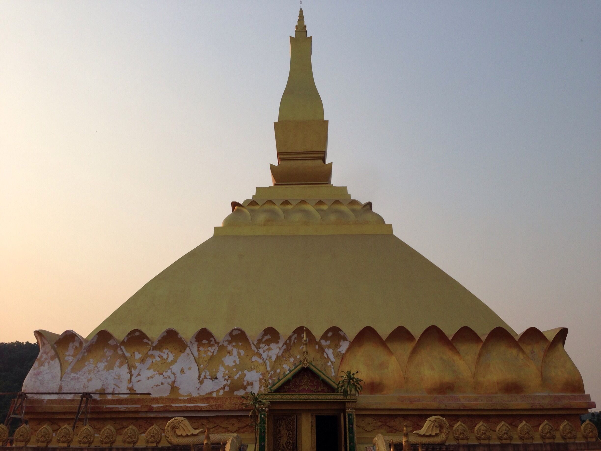 A work in progress, up on the hill in Luang Namtha town. Interesting place, as no less than 30 monks were toiling away on various projects around the relatively new Buddhist complex.