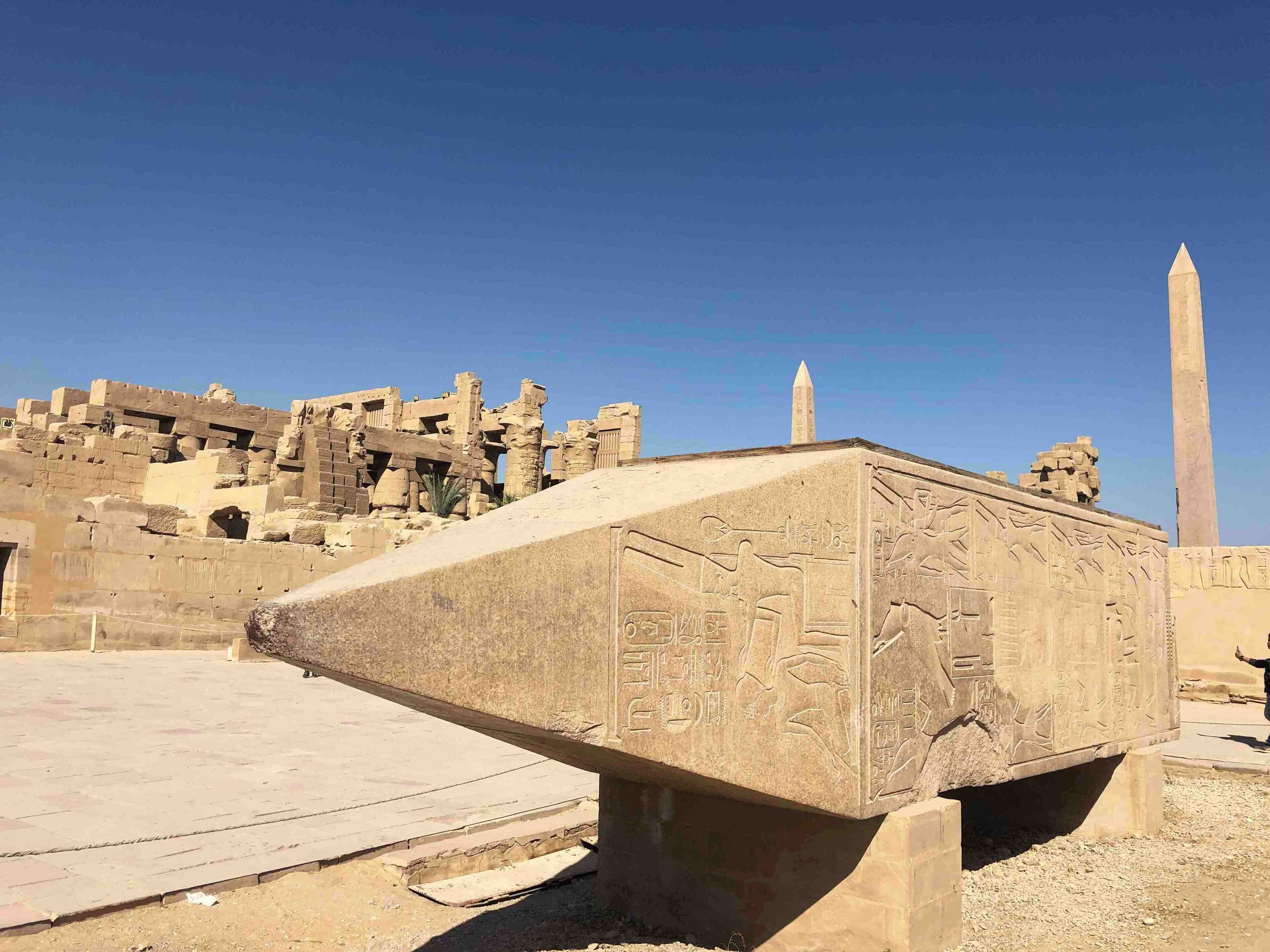 The fallen Obelisk in Karnak Temple with two standing in the background
