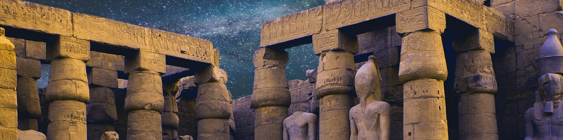 Karnak Temple, Colossal sculptures of ancient Egypt in the Nile Valley in Luxor, Embossed hieroglyphs on the wall
