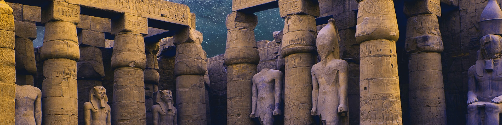 Karnak Temple, Colossal sculptures of ancient Egypt in the Nile Valley in Luxor, Embossed hieroglyphs on the wall