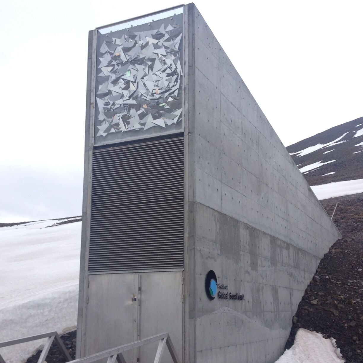 The Svalbard Global Seed Vault is a secure seedbank located on the Norwegian island of Spitsbergen near the town of Longyearbyen in the remote Arctic Svalbard archipelago, about 1,300 kilometres (810 mi) from the North Pole. The seed vault is an attempt to provide insurance against the loss of seeds in genebanks, as well as a refuge for seeds in the case of large-scale regional or global crises.