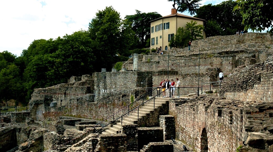 The Ancient Theatre of Fourvière is a Roman theatre in Lyon, France. It was built on the hill of Fourvière, which is located in the center of the Roman city.
The theatre was built in two steps: around 15 BC, a theatre with a 90 m diameter was built next to the hill. At the beginning of the 2nd century, the final construction added a last place for the audience.
The oldest Roman theater in France, Lyon’s Ancient Theatre of Fourvière was built under the orders of Augustus and expanded in Hadrian’s time. Completed in 17 B.C. with space for 10,000 people, today the Grand Theatre is part of the UNESCO World Heritage site of Lyon.