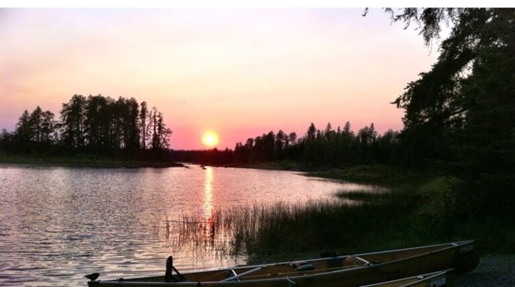 Sunset over our canoes in the Boundary Waters Canoe Area #camp
