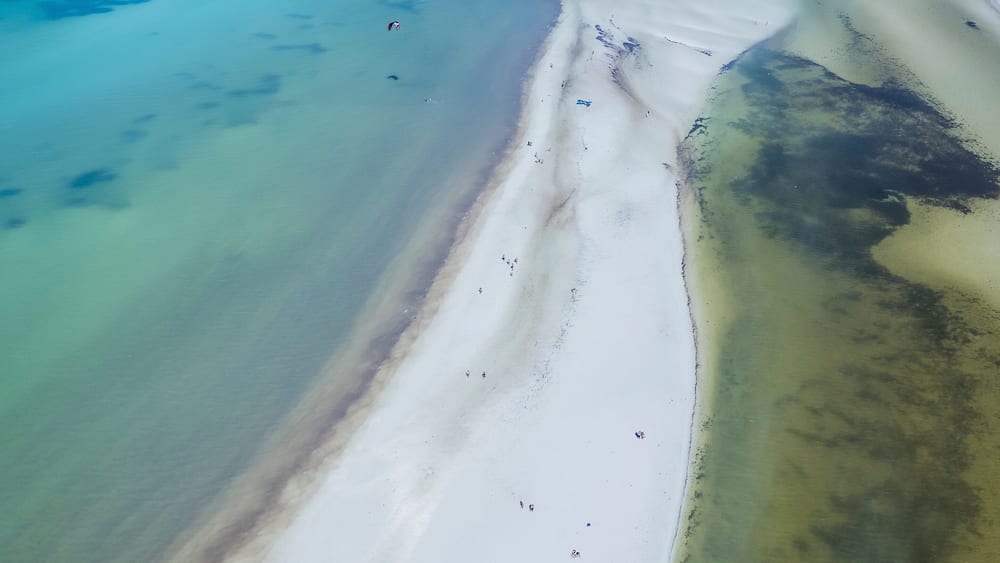 Aerial view of beautiful turquoise waters and pristine sandy beaches, Holbox, Quintana Roo, Mexico.