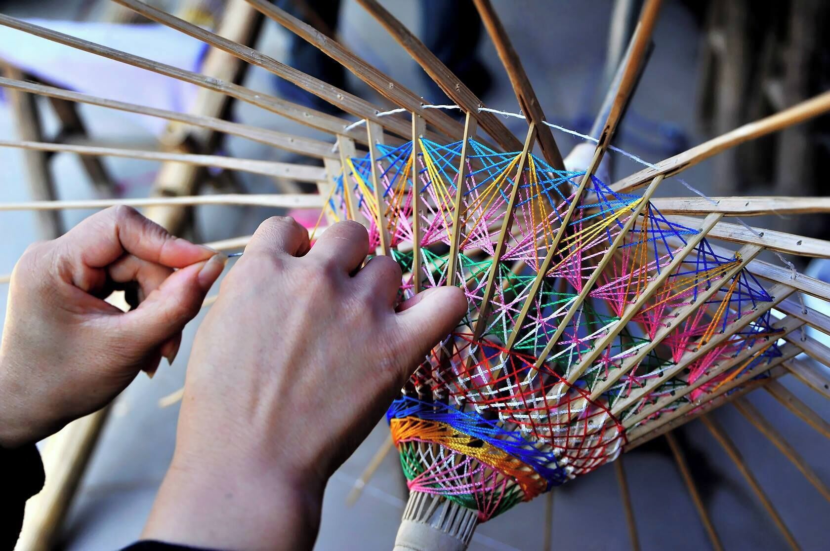 The famous Sichuan Oil-paper Umbrella has a history of more than 400 years,listed as"national-level non-material cultural heritage"in 2008. 

https://twitter.com/Beautifulgx 