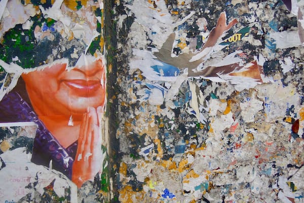 street art patchwork after sticking over and over. time rules #OnTheRoad