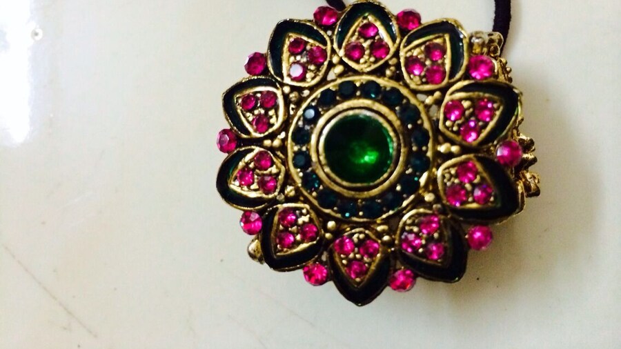 Loved this fancy hair ornament on a band. Pretty hues of pink.