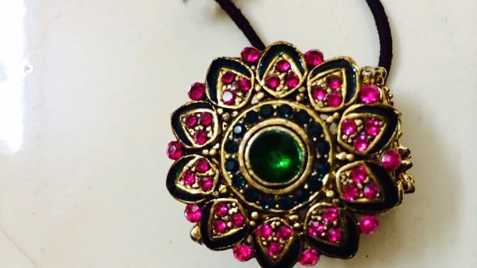 Loved this fancy hair ornament on a band. Pretty hues of pink.