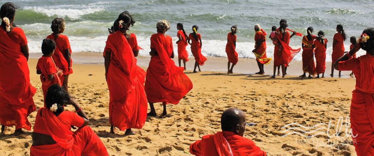 I was sitting on the beach looking out at the Bay of Bengal. It was gorgeous; wide, open ocean.
Suddenly, ever so quietly, these pilgrims adorned in red, passed by me one by one, heading towards the same water I was just looking out at.
IT WAS AMAZING.