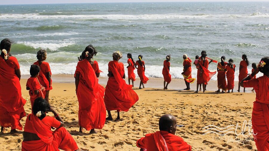 I was sitting on the beach looking out at the Bay of Bengal. It was gorgeous; wide, open ocean.
Suddenly, ever so quietly, these pilgrims adorned in red, passed by me one by one, heading towards the same water I was just looking out at.
IT WAS AMAZING.