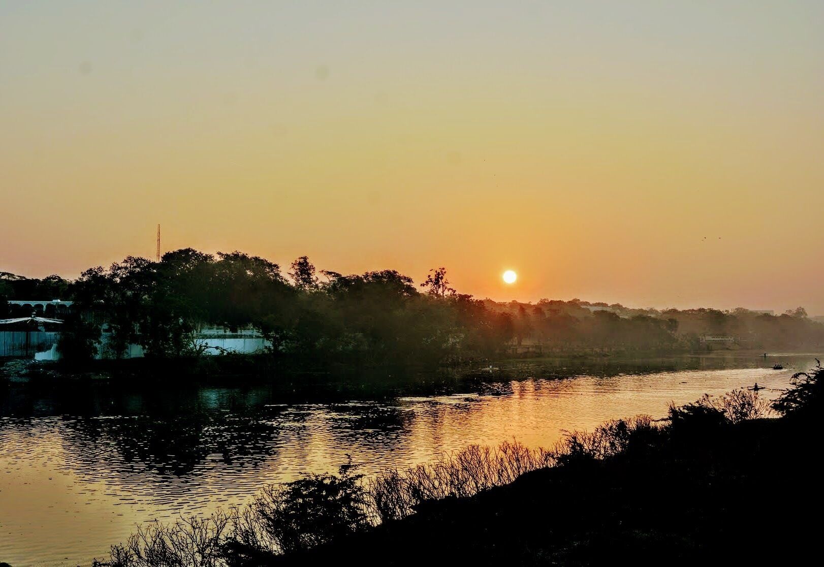 Sunrise over the Adyar river taken from the Kotturpuram bridge. The Adyar is one of the 2 main rivers flowing through the southern Indian city of Chennai. #Golden