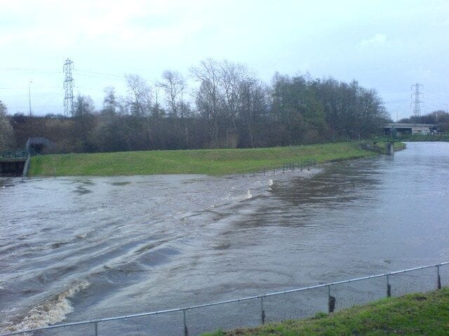 Running High - River Mersey. The Mersey at Northenden weir after a few days of heavy rainfall in the area and upstream. Compare this with a picture taken from the opposite bank in March 2007 (354365).